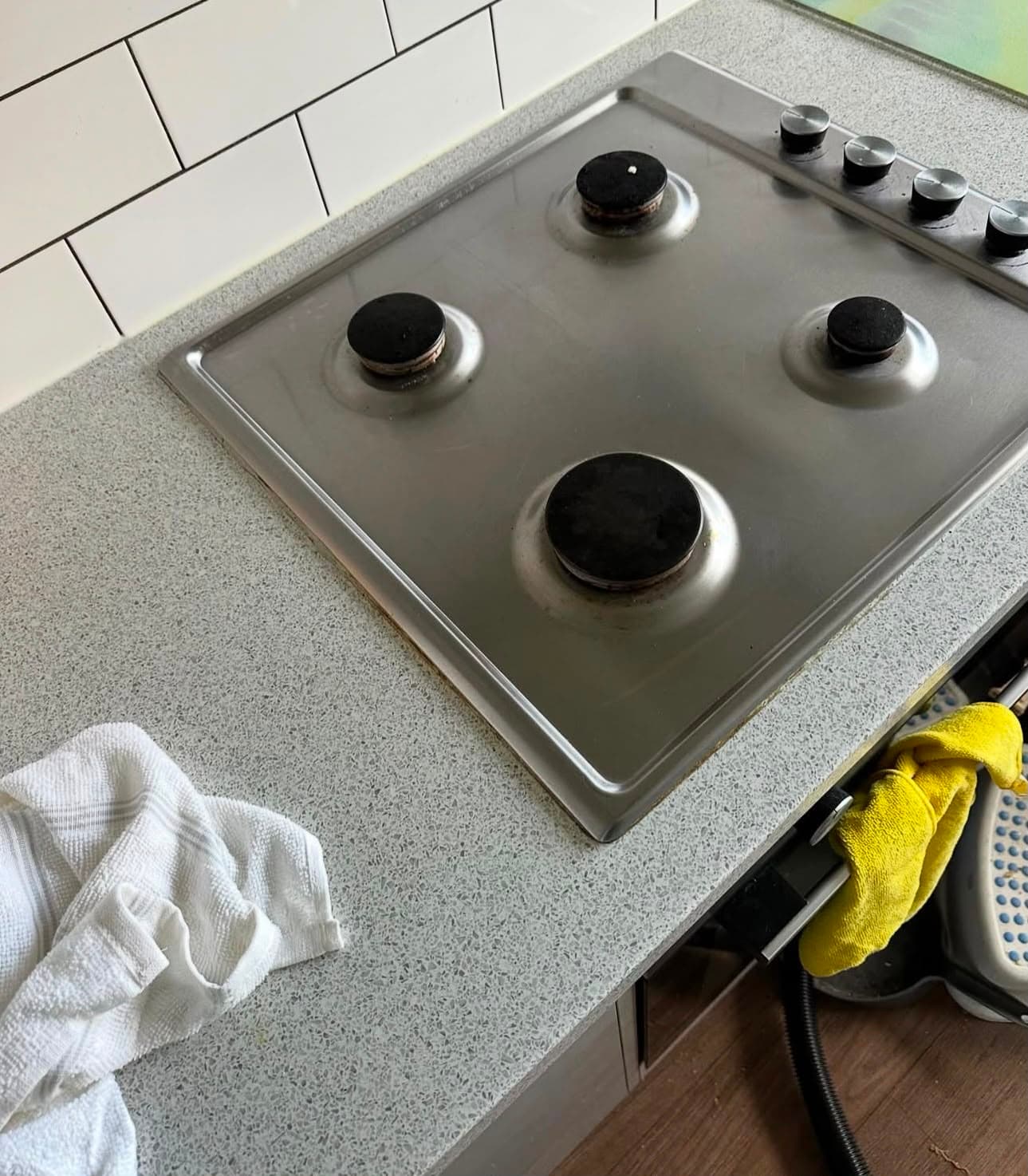 After — the same hob, cleaned back to bare steel